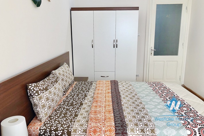 Bright and Fully Furnished Two Bedrooms Apartment for rent in Van Cao st, Ba Dinh district.